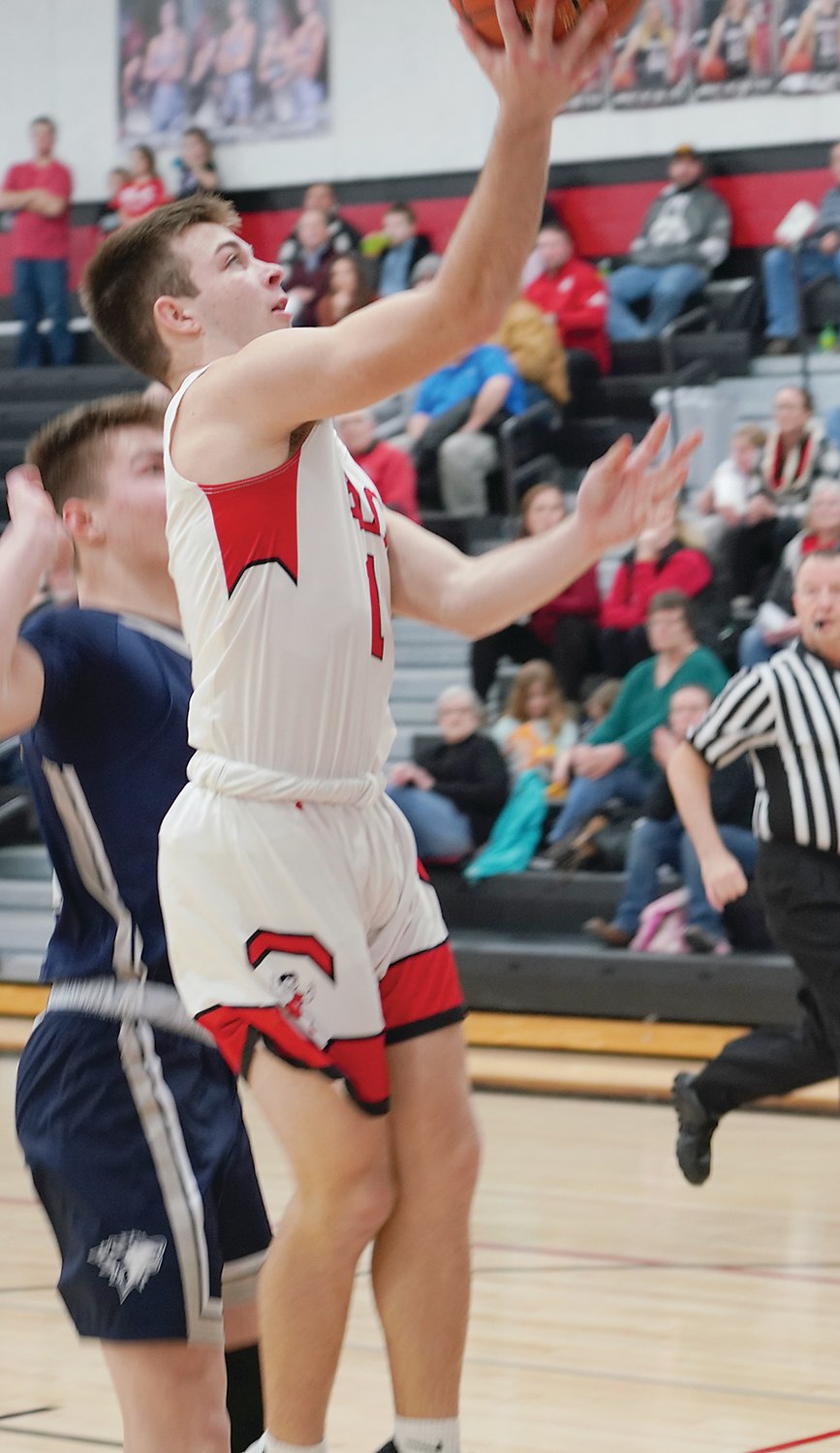 ELC senior Ryan Schiltz scored all 18 of his points in the second half against Western Christian, but the Wolfpack prevailed over the Midgets, 68-58, on Tuesday.
Photo by David Swartz