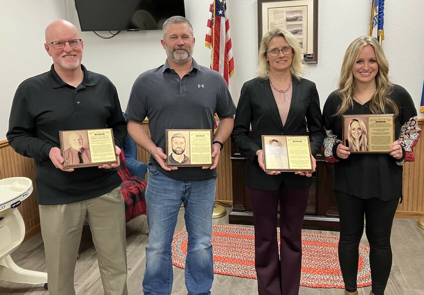 Mike Murray (far left), Chip Marty (center left), Amy Hedrick (center right), and Jenny Gustaf (far right) were inducted into the Royall Hall of Fame in recognition of their athletic achievements while attending Royall High School.