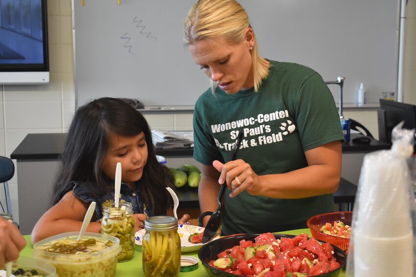 As part of their Cucumber Crunch feast, students were able to try a variety of different items, including fermented produce they had made the week prior and a summer salad featuring cucumber, watermelon, and feta cheese.