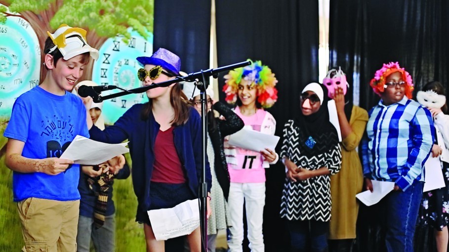 Scenes from the fifth grade production, above and below.