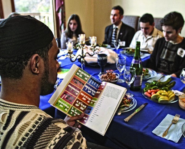 People of various faiths and nationalities attend a Seder in Michigan.