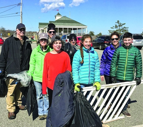 On Good Deeds Day, April 2, Congregation Beth David  members took to the beach to help make it clean and safe:  (left to right) Michael jemal, Beth Dworetzky, Bob Fricklas, jacob Jemal, Maysy Fricklas, Lily Liebermensch, Dara Liebermensch and Ben Liebermensch. Other organizations throughout the Rhode Island Jewish community participated, too.