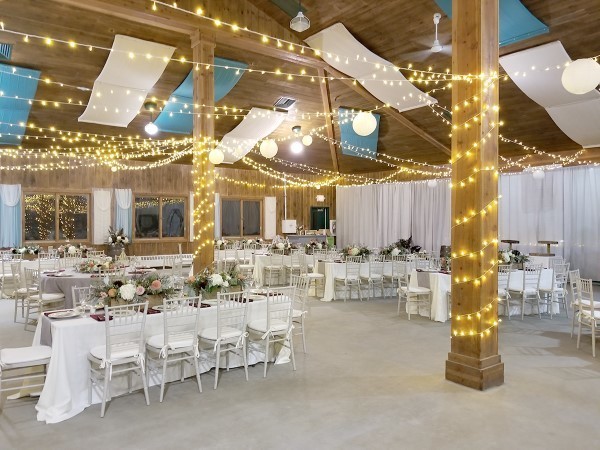 The JORI dining hall was transformed for the weddings. Parties of many sizes can be accommodated. Guests can stay in the cabins and use the camp facilities.