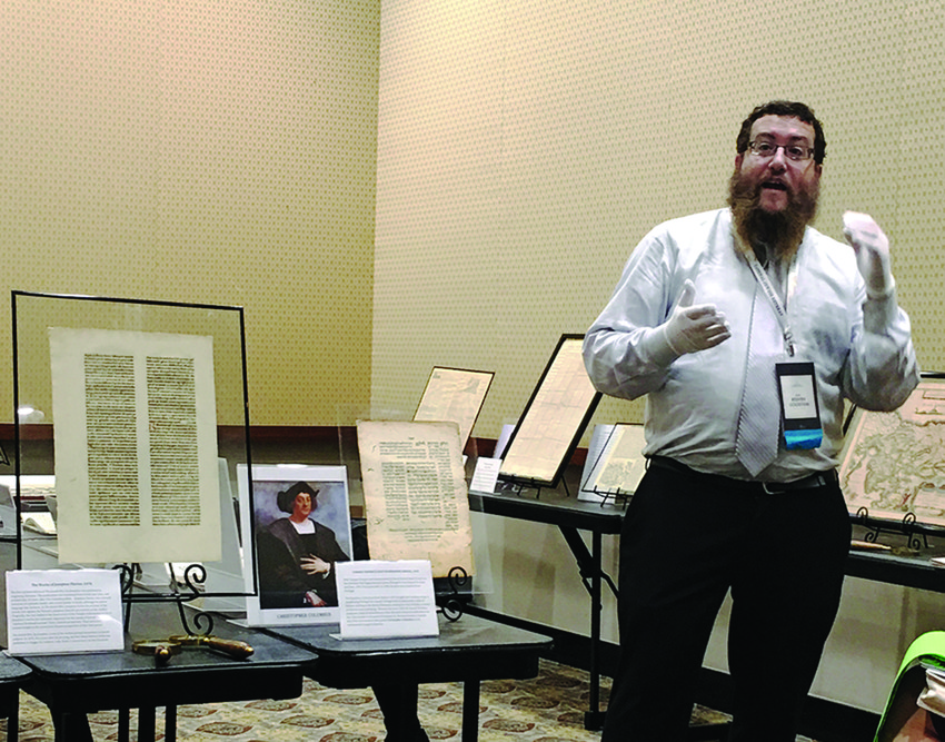 Reuven Goldstein, one of the speakers at the retreat,   with earliest examples of printed Hebrew.