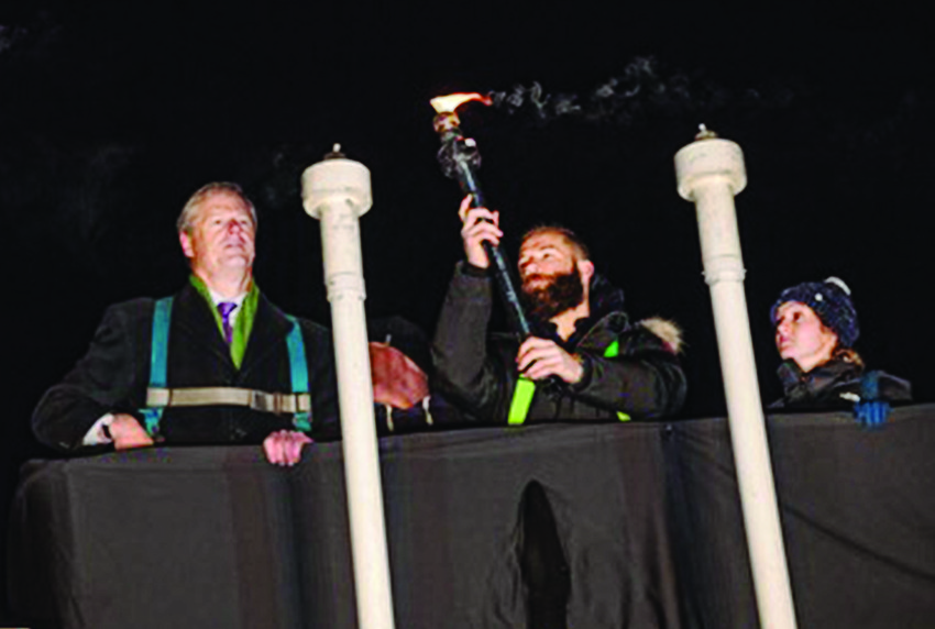 In Massachusetts, New England Patriots player Julian Edelman, above, lights the menorah in Copley Square (in the lift with him are Governor Charlie Baker and Emily Becker whose family are Chabad supporters).  And later, left, at the event that took place Dec. 6, Edelman is pictured with, (left to right) &nbsp;Governor Charlie Baker, Rabbi Mayer &nbsp;Zarchi of Chabad Boston, &nbsp;Boston Councilman Josh Zakim, and Rebbetzin Chenchie Zarchi.