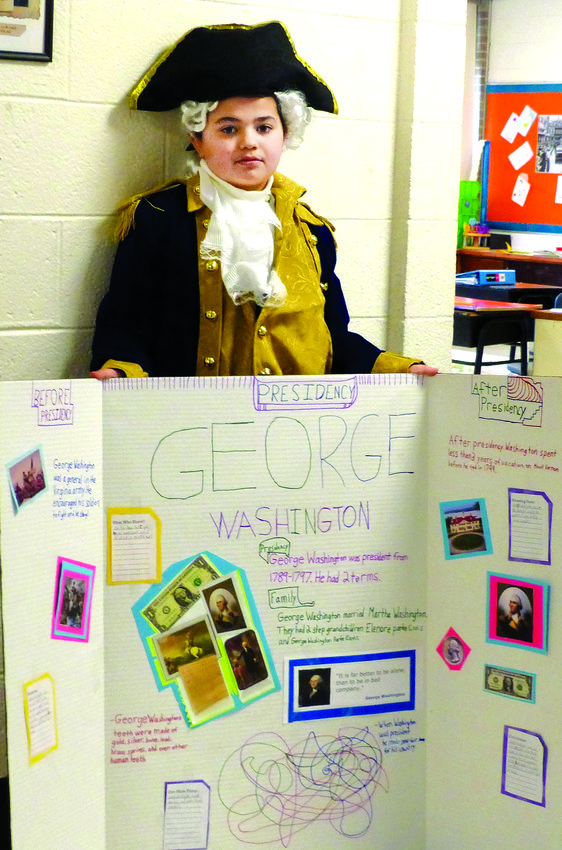 George Washington (Eliyahu Minkin) with a display about this life.