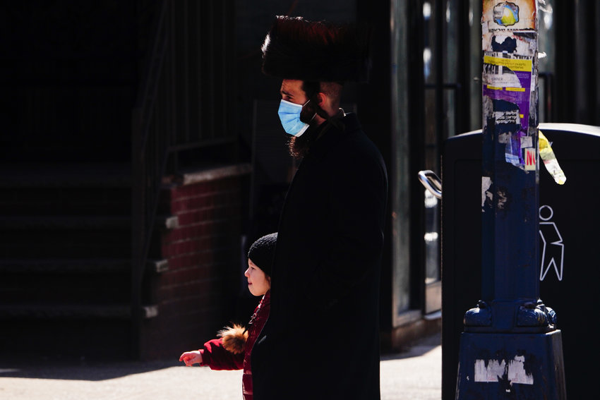 A view of orthodox jewish men wearing mask during Passover in Williamsburg in Brooklyn New York USA during coronavirus pandemic on April 11, 2020. (Photo by John Nacion/NurPhoto)