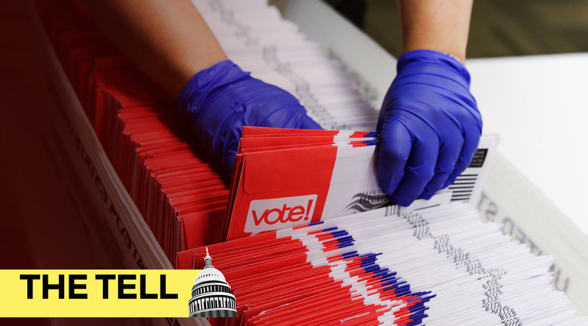 Election workers sort vote-by-mail ballots for the presidential primary at King County Elections in Renton, Washington on March 10, 2020.