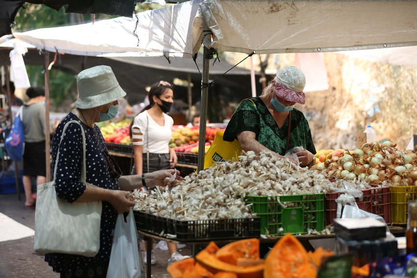 Shoppers are back at Israeli outdoor markets, such as this one in Tzfat, pictured July 15, 2020, but Delicious Experiences lives on.
