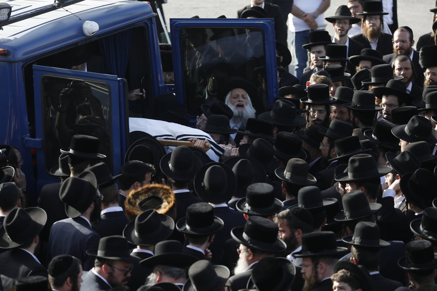 Hundreds of ultra orthodox jewish attend the funeral of Yehuda Lev Lubin in Jerusalem, one of the victims of the Meron tragedy, where 45 people were crushed to death last night, and several more injured, at amass event for the Jewish holiday of Lag B'Omer, in Meron, Northern Israel, April 30, 2021. Olivier Fitoussi/Flash90