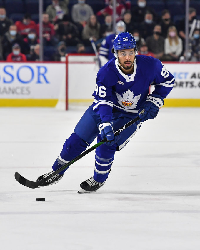 LAVAL, QC - OCTOBER 27:  Josh Ho-Sang #96 of the Toronto Marlies skates the puck against the Laval Rocket during the first period at Place Bell on October 27, 2021 in Montreal, Canada.  The Laval Rocket defeated the Toronto Marlies 5-0.  (Photo by Minas Panagiotakis/Getty Images)