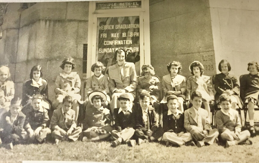 This 1950 photo is of the 1949-50 pre-primary (kindergarten) class at Temple Beth El&rsquo;s Sunday School. Teacher was Eleanor Lechan. The writer is the third boy from the right. The little girl with the broad brim hat is Eileen Shaw Horwitz who also now lives in Providence.