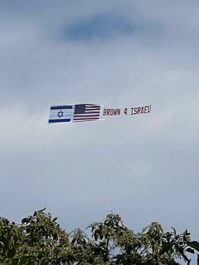 Banner flying over the East Side of Providence May 26.