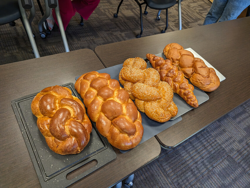 The challahs lined up for sampling: (left to right) Miami Onion Bakery, Maven&rsquo;s Delicatessen, Navad Bakers, Oak Bake Shop, Seven Stars.