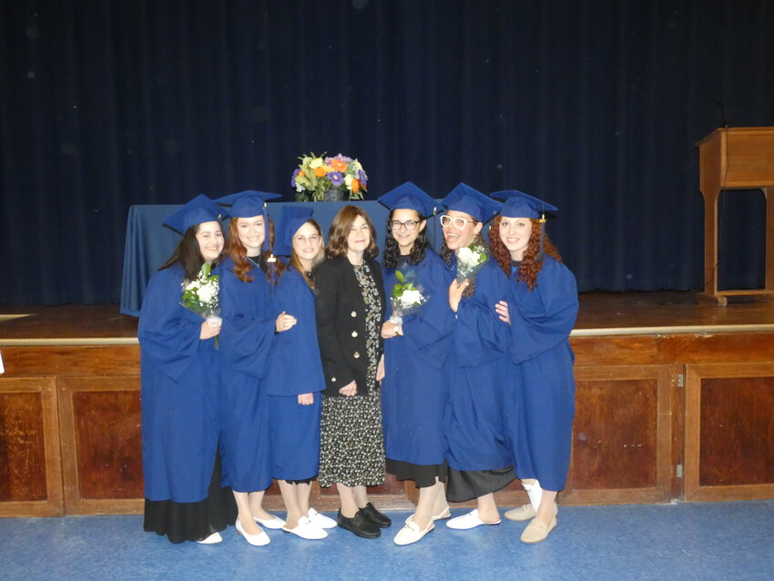 New England Academy of Torah graduates with their Principal, Marsha Gibber, at their graduation on June 9.