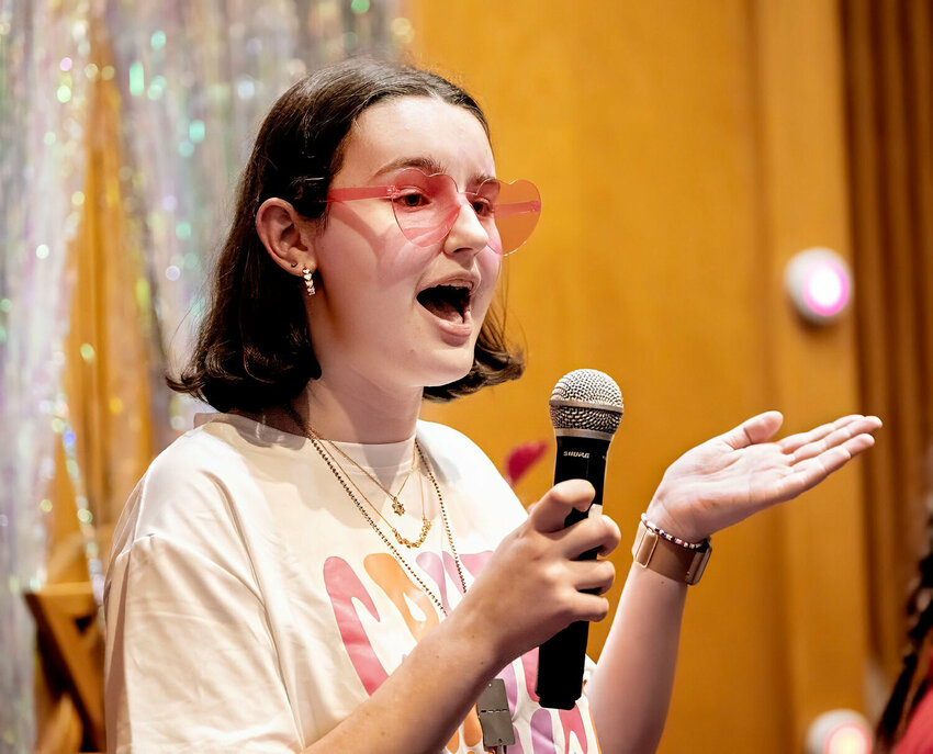 Paulina Sobel, 15-years-old, of Barrington, sang a song, and was the stage manager for the show.