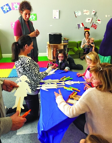 Children under age 5 gathered Feb. 24 at the Dwares JCC in Providence to learn about Purim with a story and fun activities including a craft. A snack was also provided.
