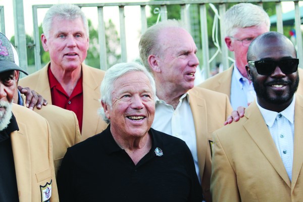 Robert Kraft, in black shirt, with Hall of Famers Marshall Faulk, right, and, in rear, from left, Ron Yary, Roger Staubach and Dave Casper in Ramat Hasharon, Israel, June 15.