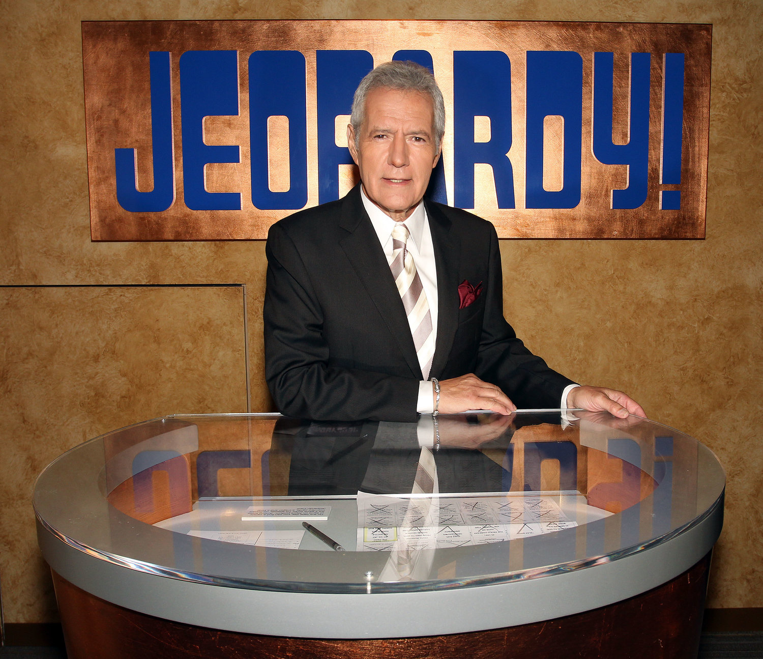 Alex Trebek poses on set at Sony Pictures in Culver City, Calif., for the premier of the 28th season of "Jeopardy," Sept. 20, 2011.