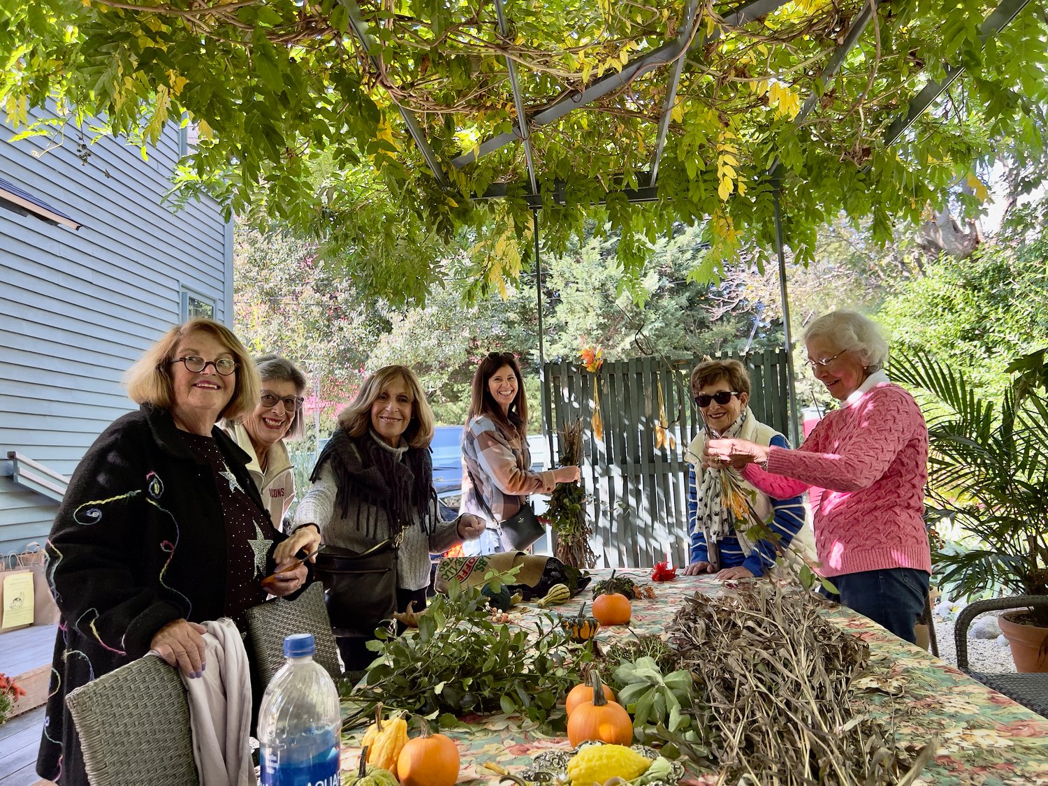 The Newport Havurah recently gathered at the home of Mary and Howard Newman to decorate and celebrate Sukkot.