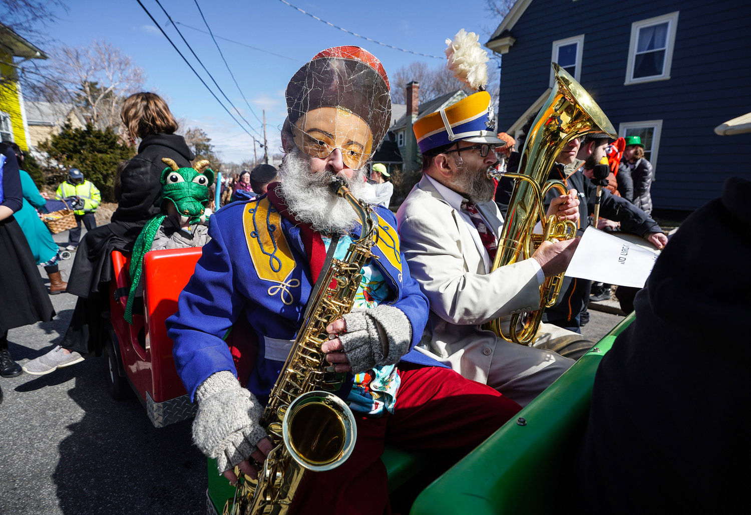 Fishel Bresler, of Pawtucket, plays the saxophone as the parade turns onto Morris Avenue.