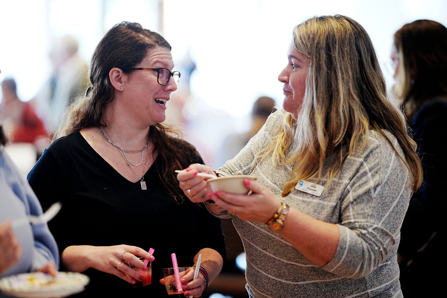 Trying out the foods at the event are Marisa Kranz, left, and Joie Magnone, right, both of Warwick.
