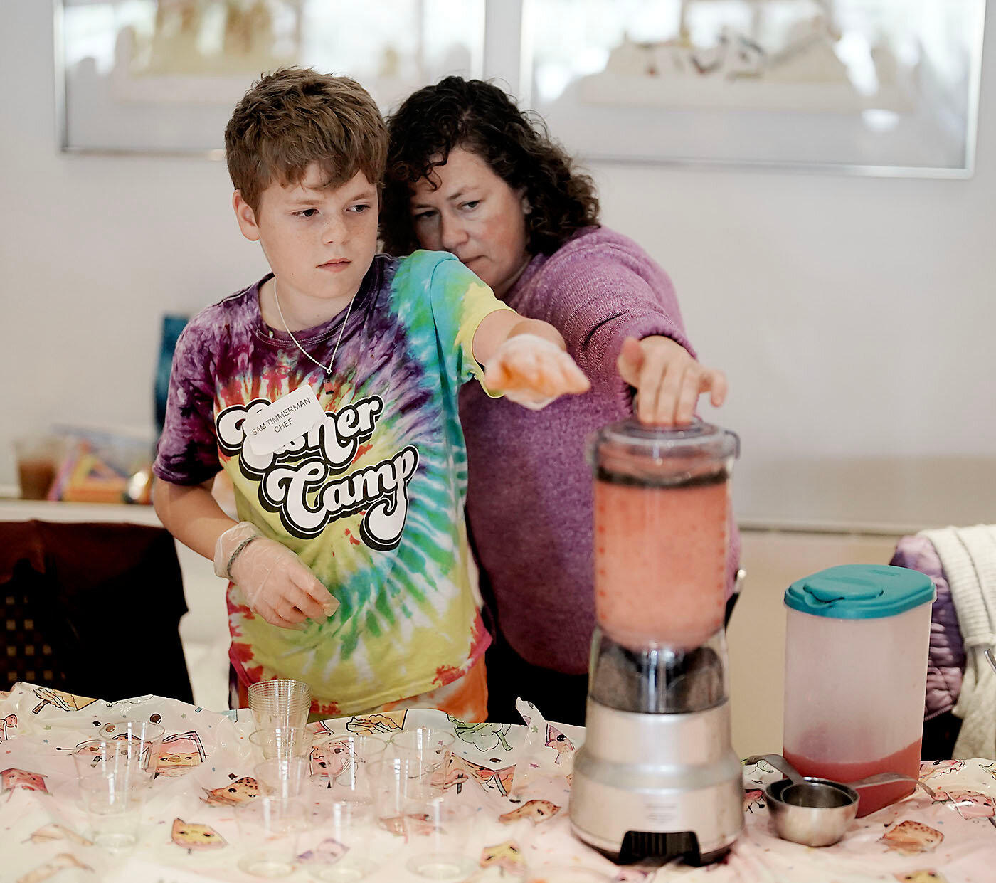 Sam Timmerman, and his mother Debby Levine, of Providence, blending a Thai watermelon slushie.