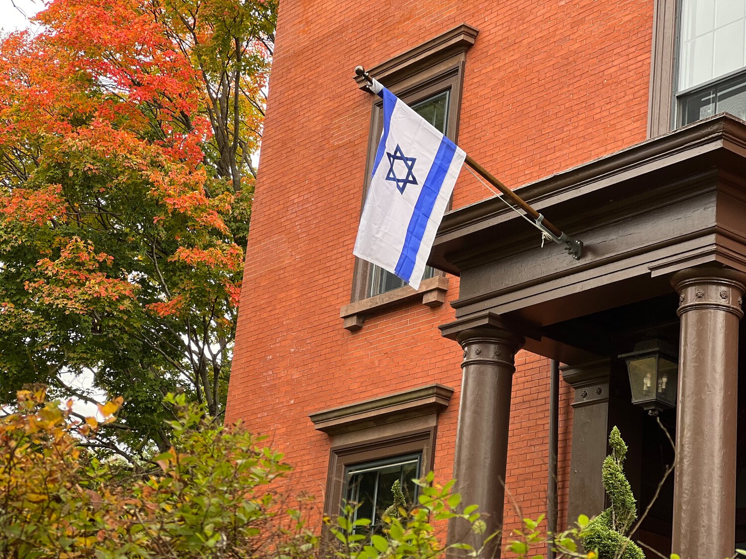 Providence Mayer Brett Smiley flies the Israeli flag outside his house in Providence. An Israeli flag also flies outside Providence City Hall.