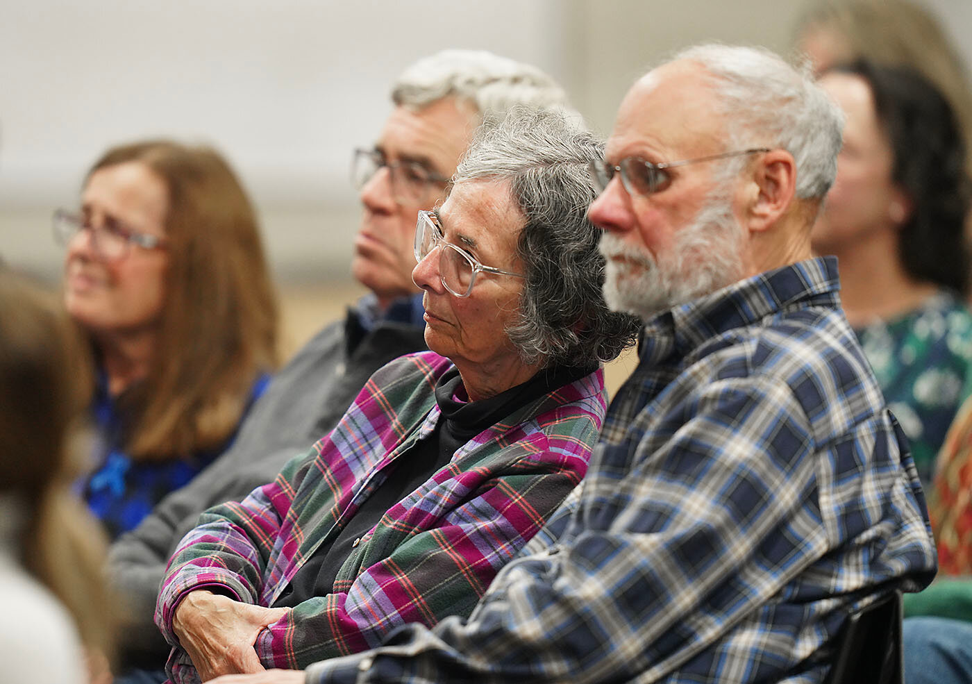 Attendees at the annual Kristallnacht program on Nov. 9, 2023, listen to Mike Fink discuss his documentary on Rhode Island Holocaust survivors.