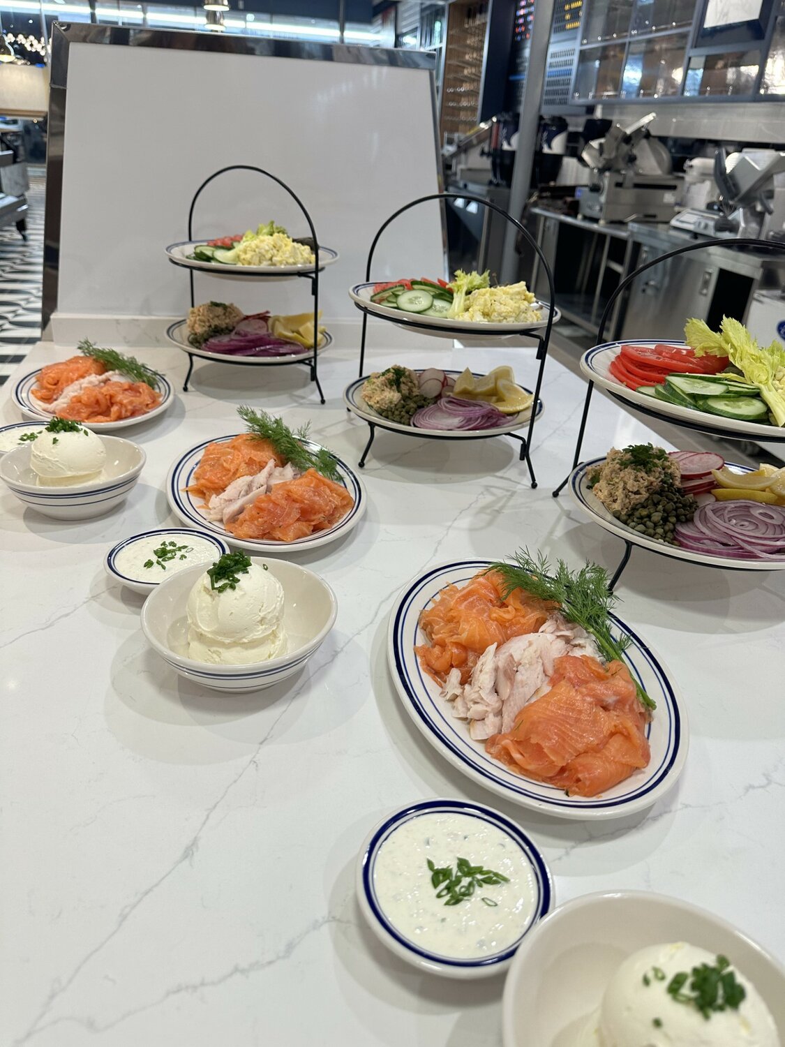 Platters of lox and whitefish with all the accompaniments.