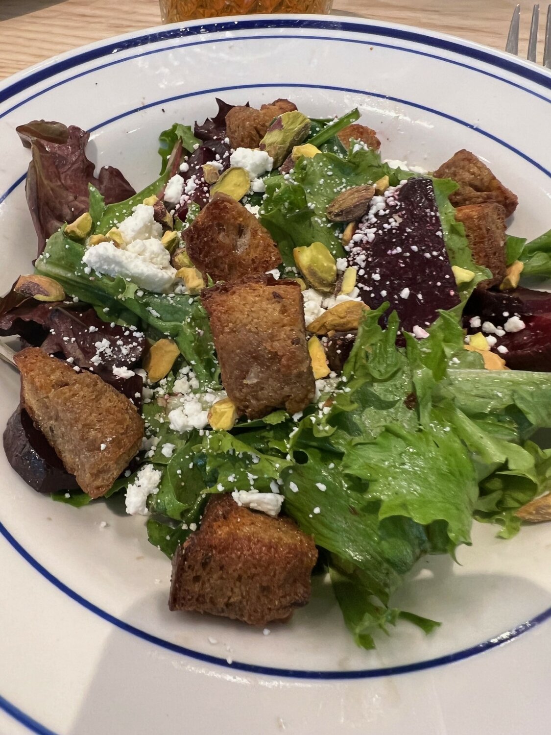 Beet salad with homemade sourdough rye croutons.