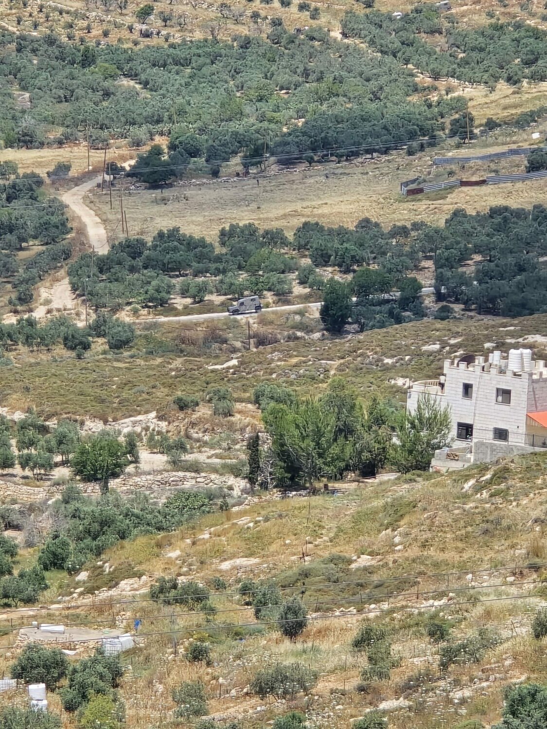 Seven Palestinians wounded in West Bank settler raid, some by IDF fire