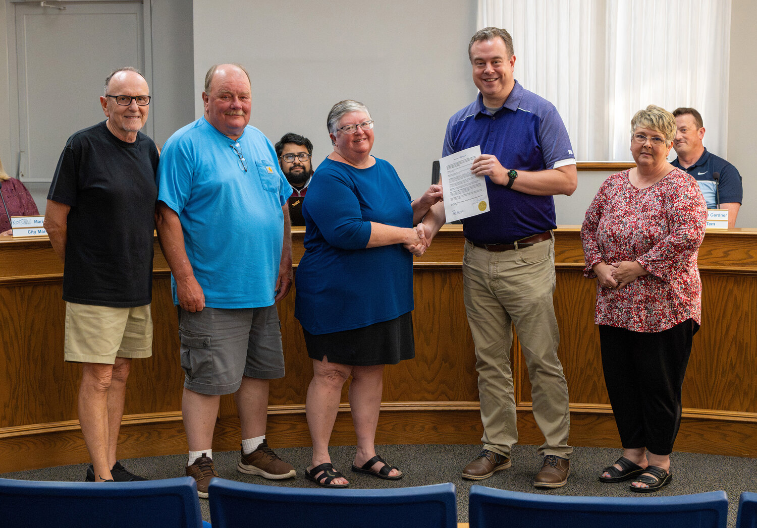 Kirksville city officials congratulate Jeanie Ewing on retirement after more than three decades of service