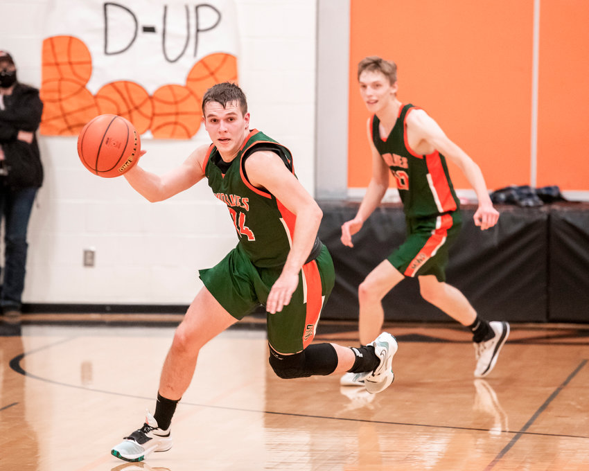 MWP&rsquo;s Carter Dantinne (24) takes the ball up the court after a steal during a game against the Tigers in Napavine Tuesday night.