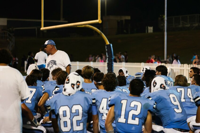 Chapin head coach Justin Gentry addresses his team after their emotional 63-0 win over Mid-Carolina.
