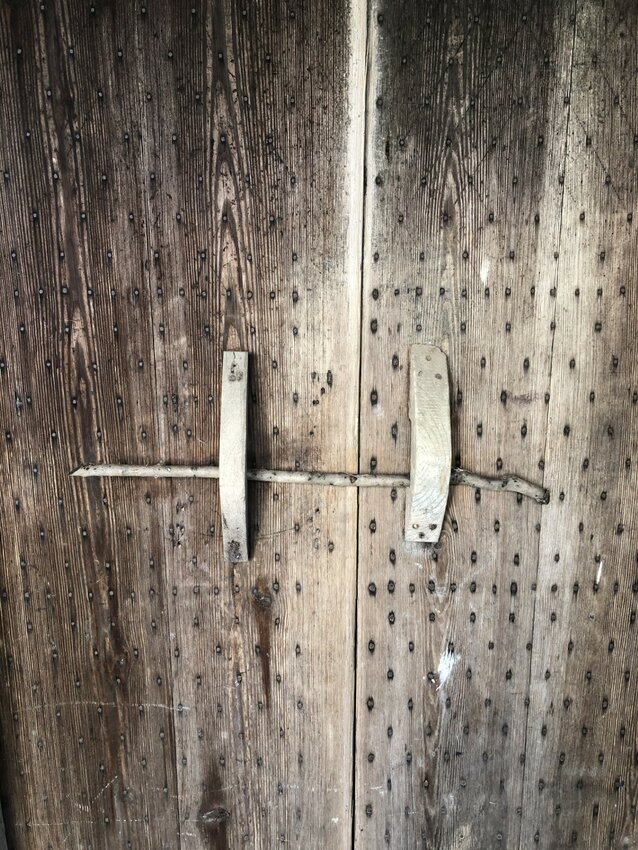 Rows of nails, a security measure of old.
