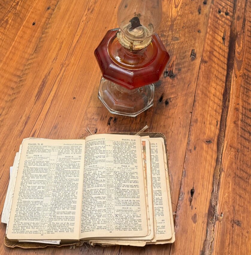 Two old friends, the family Bible and the kerosene lamp.