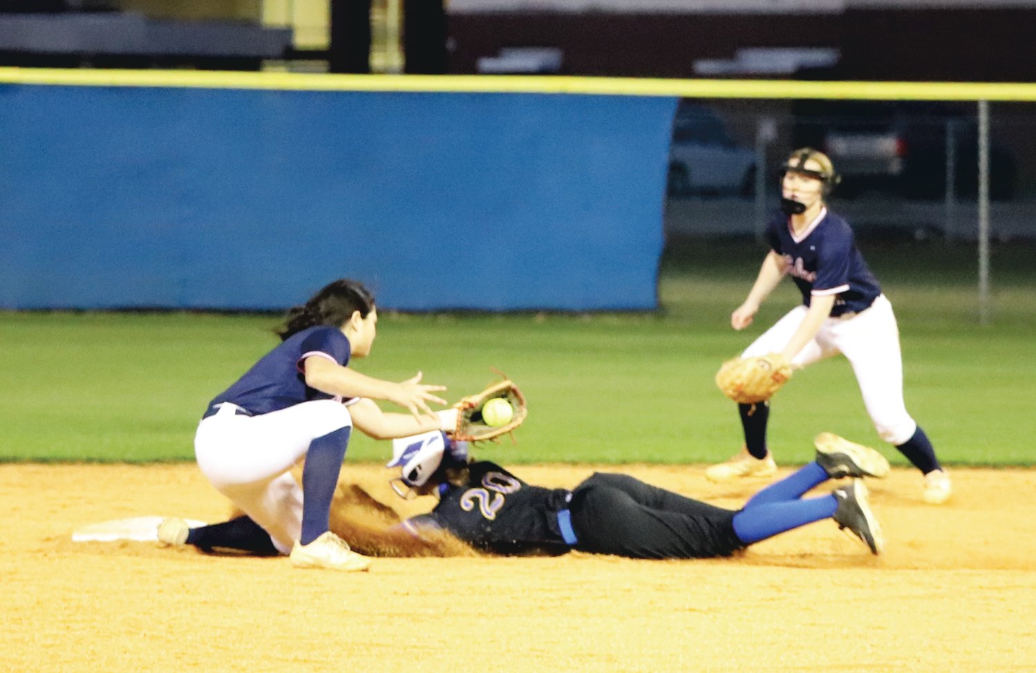 Lexington's Addison Hoffner steals second base