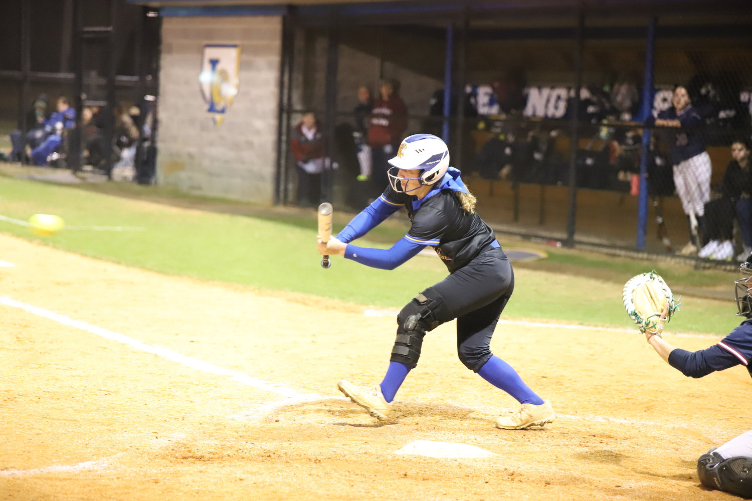 Lexington's Madison Rogers with the bunt.