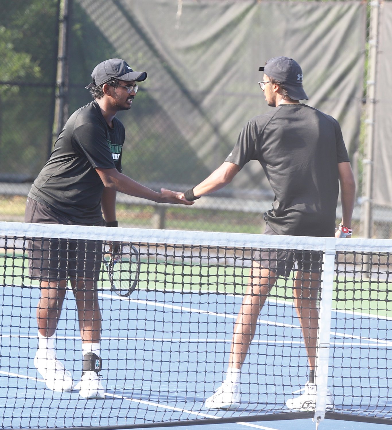 The River Bluff doubles team celebrate a point.
