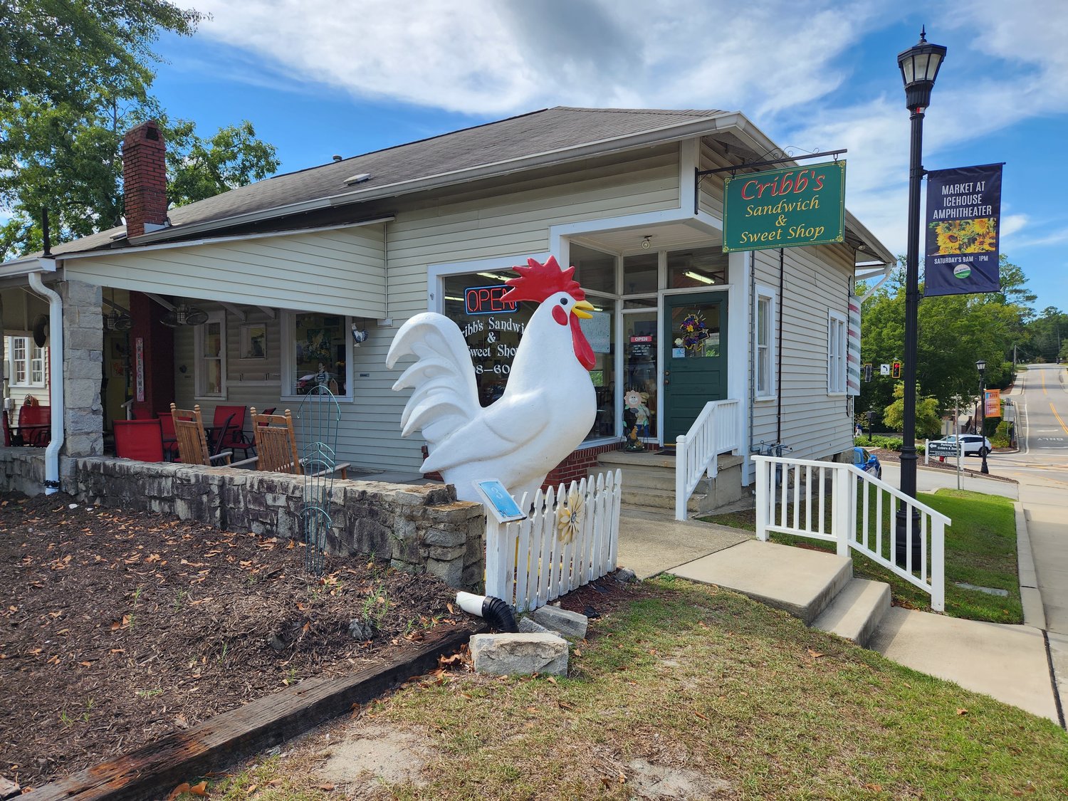 A rooster sculpture identifies Cribb’s Sandwich and Sweet Shop to drivers headed down South Church Street.