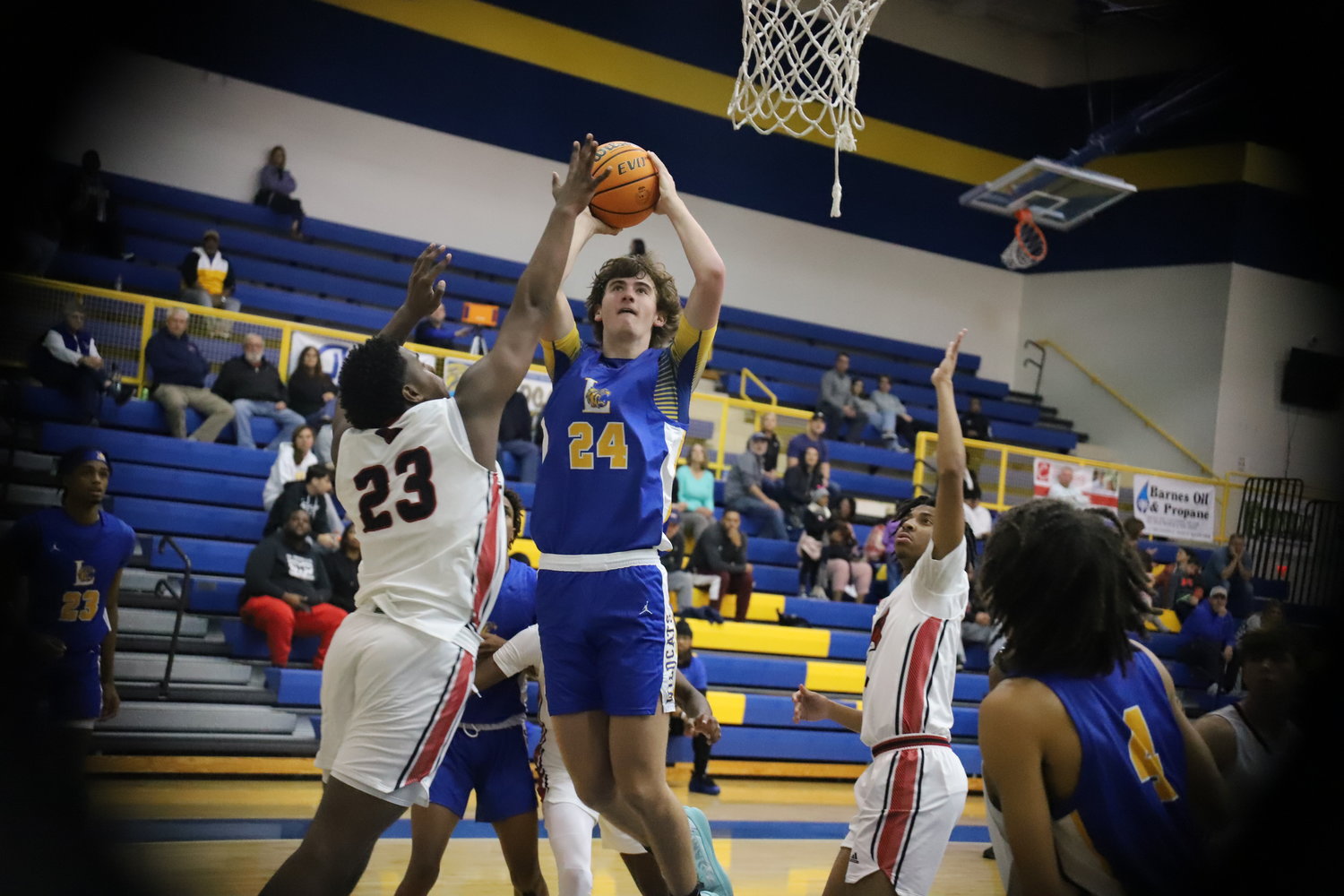 Lexington's Caleb Campbell with the offensive rebound and putback.