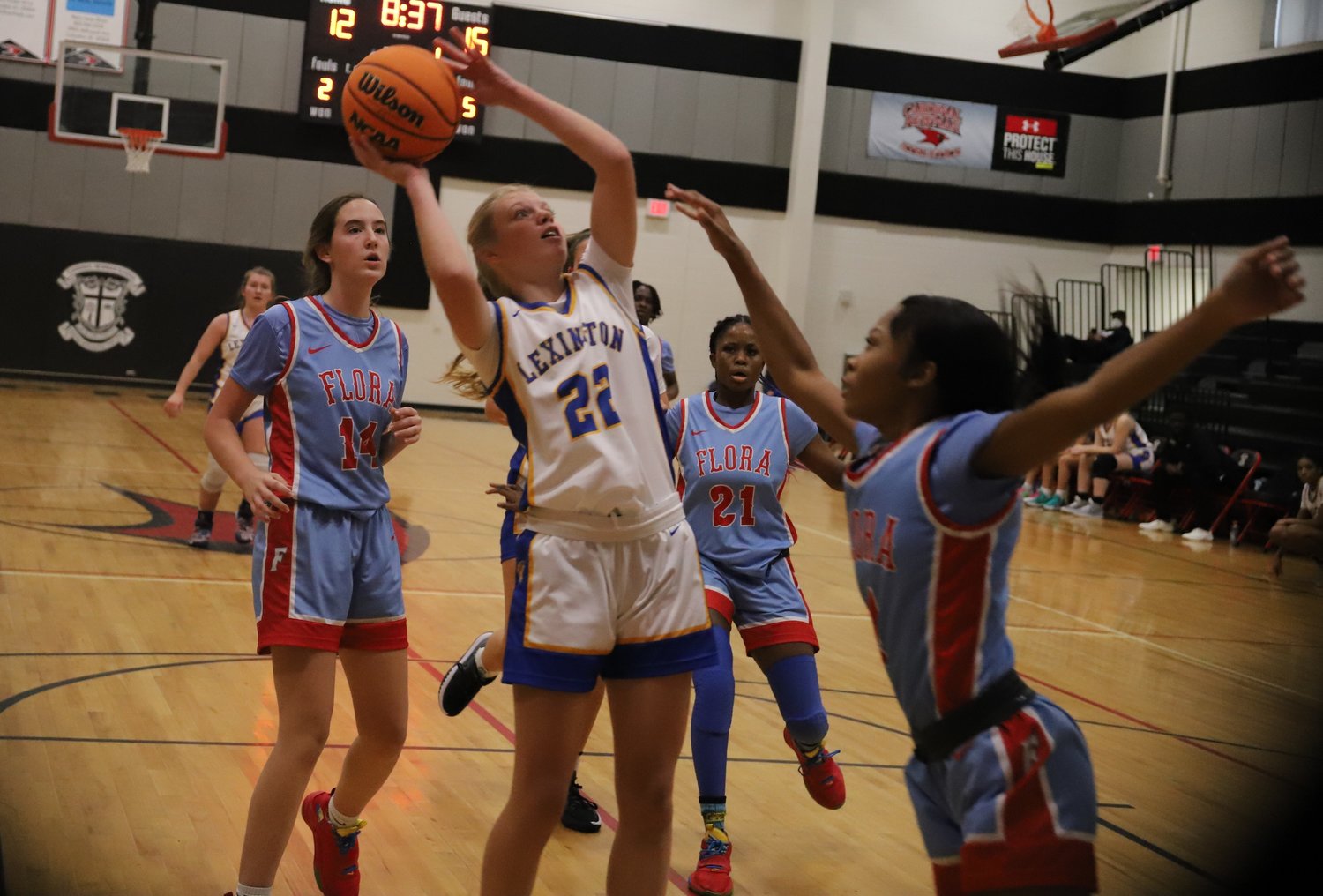 Lexington guard Izzy Saville goes up for the jumper.