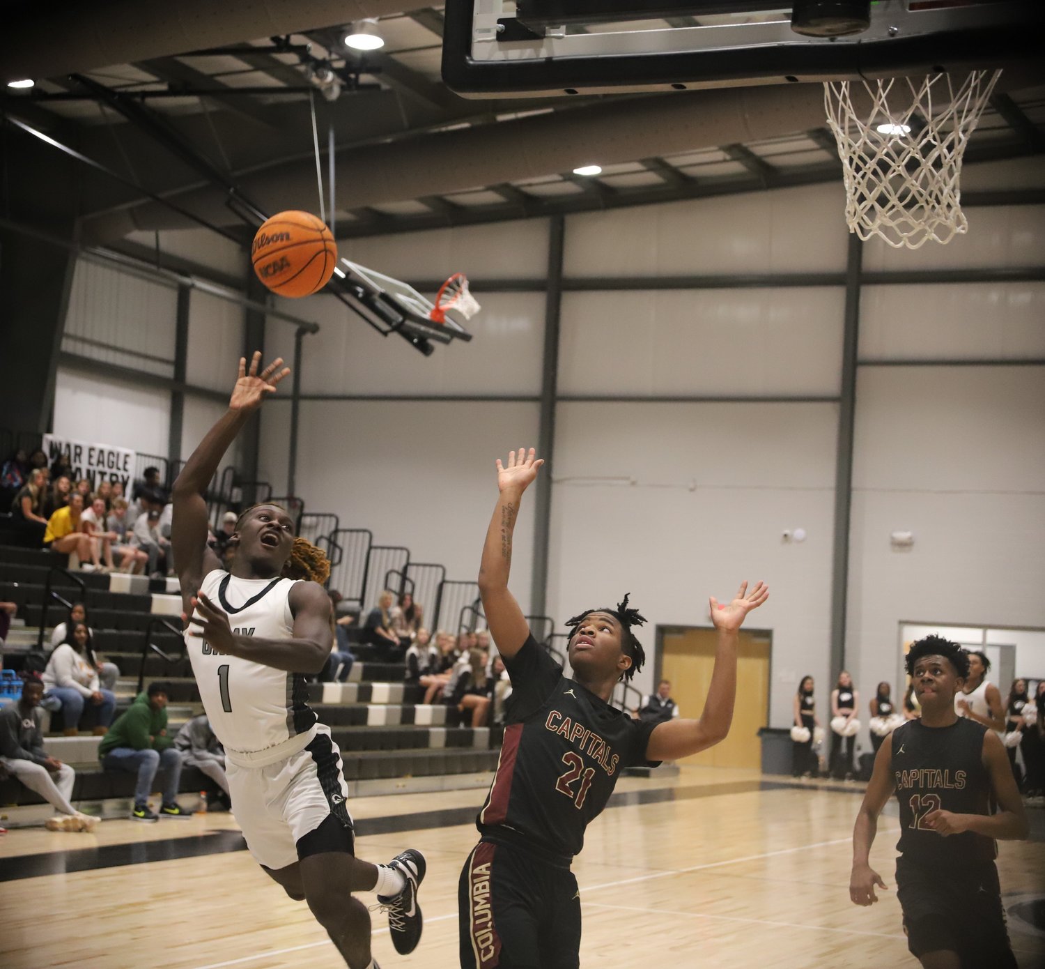 Gray Collegiate Academy guard Montraivis White with the off-balanced layup against Columbia.