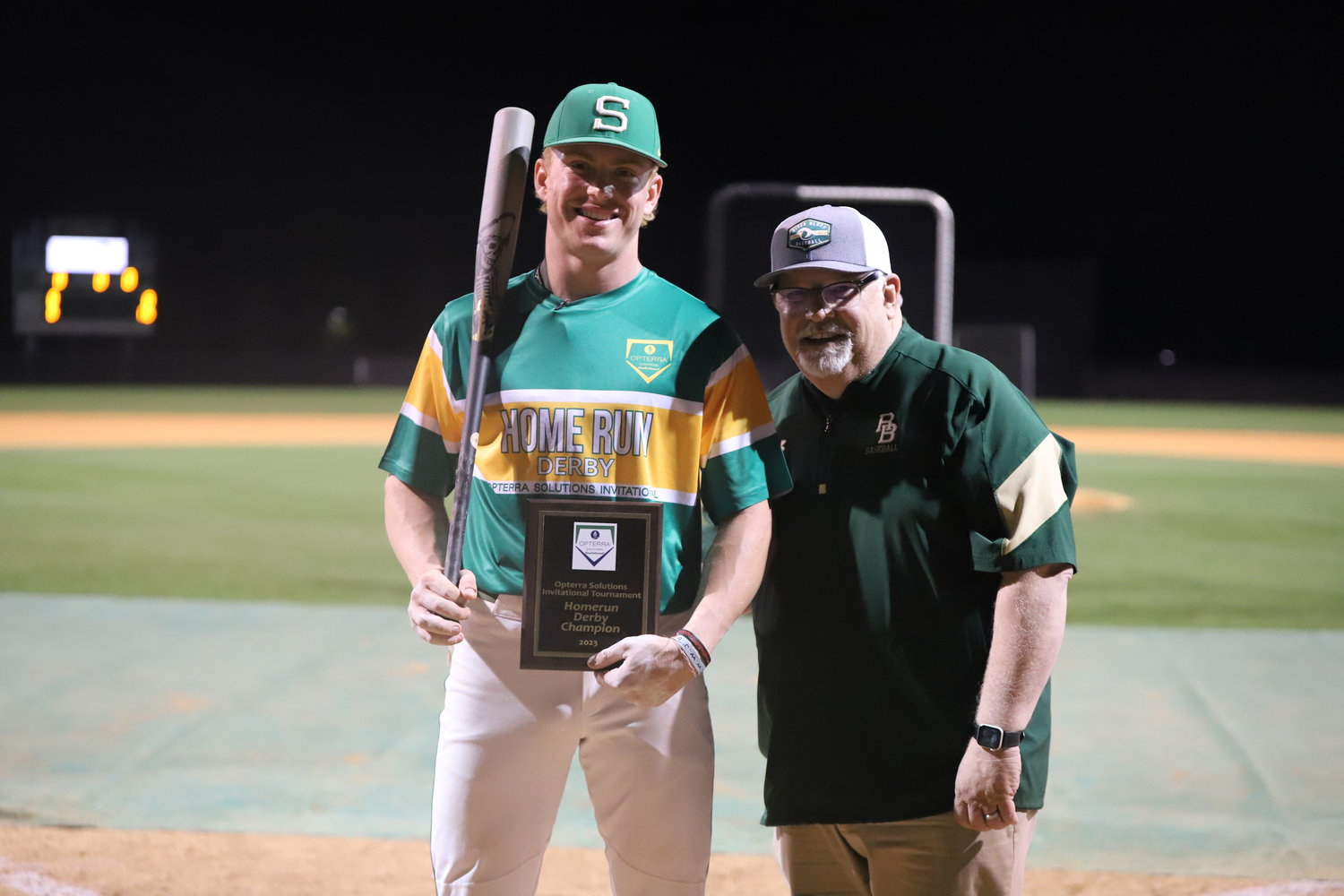 Summerville's P.J. Morlando receives the Home Run Derby winning plaque from Opterra Solutions Invitational co-founder Jeff Parsons.