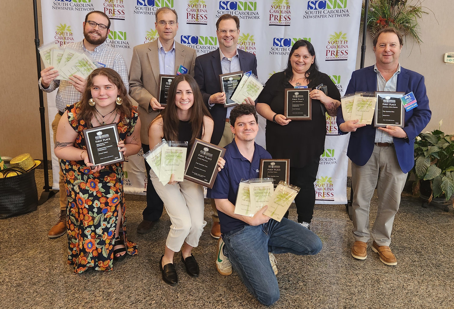 Staff members and owners of the Chronicle and sister paper The Sumter Item pose with awards won at the S.C. Press Association banquet on March 10.