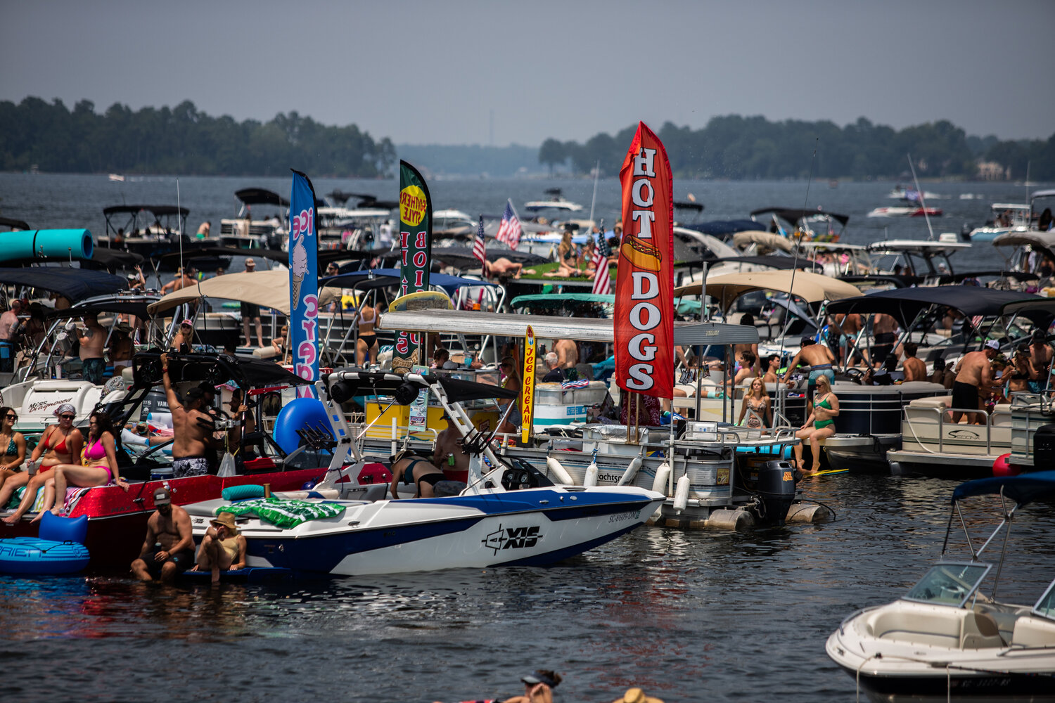 The SunDogs boat floats among the revelers at June’s Reggaetronic Lake Murray Music Festival.
