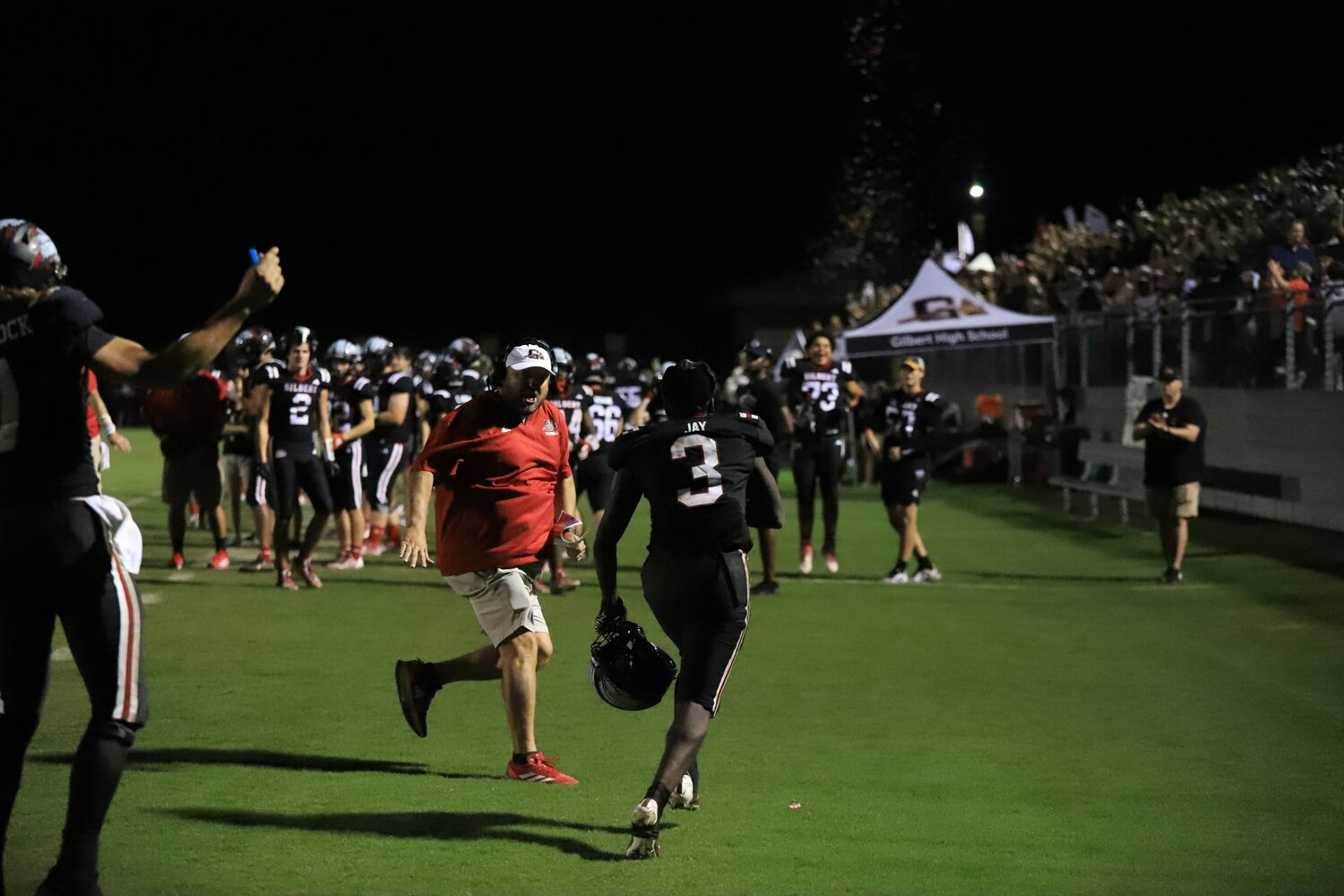Gilbert running back Jaylen Jay runs to the sideline following his touchdown to give Gilbert the decisive 14-3 lead.