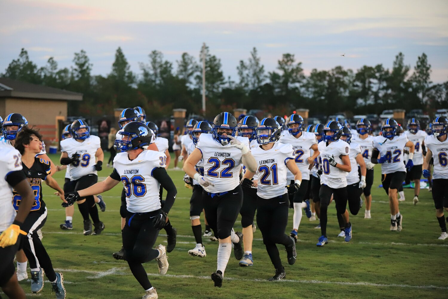 The Lexington Wildcats made their way onto the field before their game against Gilbert.