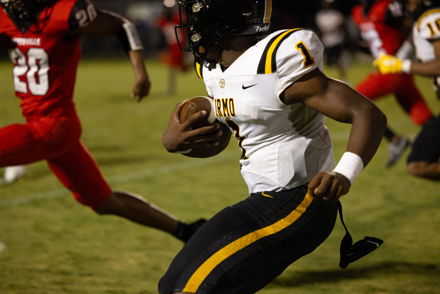 Yellow Jackets quarterback Aaron Brand runs the ball down the field in the second quarter of Irmo's 35-21 win over Hartsville.